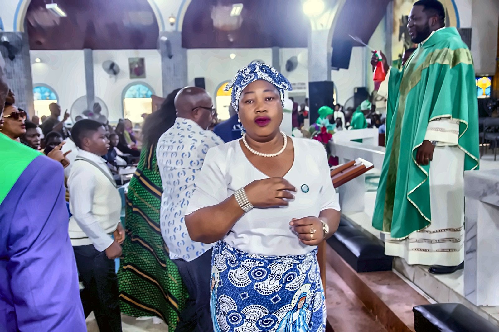 A parishioner takes part in the celebration