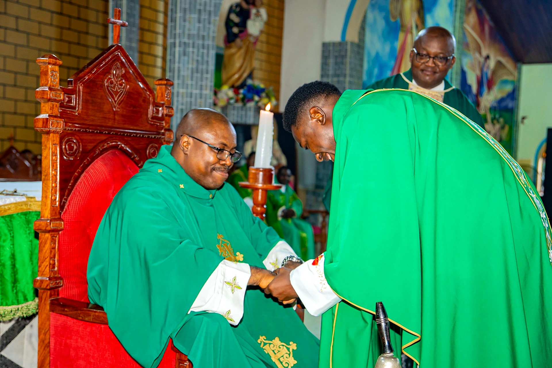Fr. Mark Ameh Installed as Parish Priest of St. Joseph the Worker, Bonaberi Fr. Godwin greets Fr. Mark
