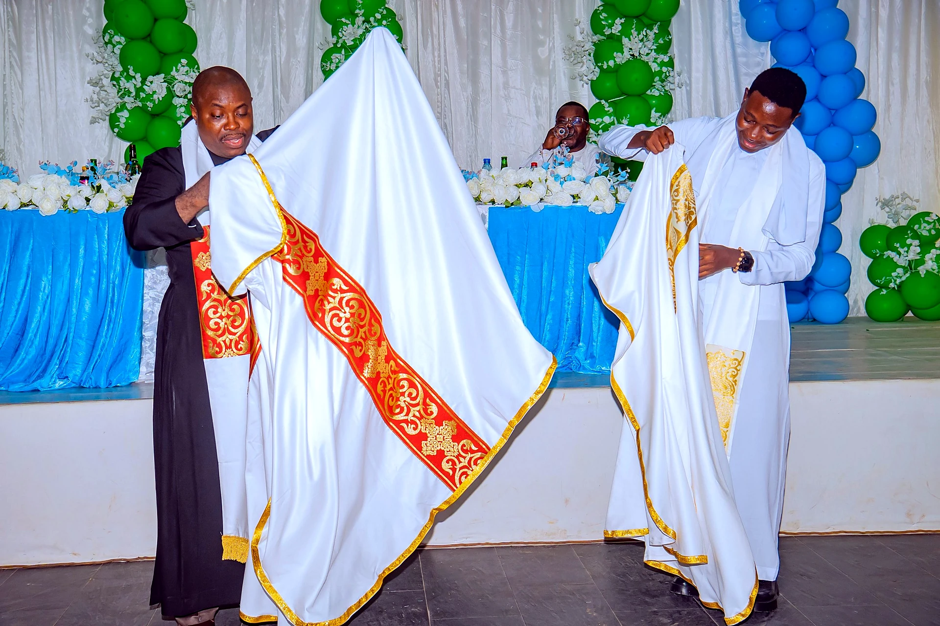 Fr. Mark Ameh Installed as Parish Priest of St. Joseph the Worker, Bonaberi Fr. Mark and Fr. Godwin in their new chasubles
