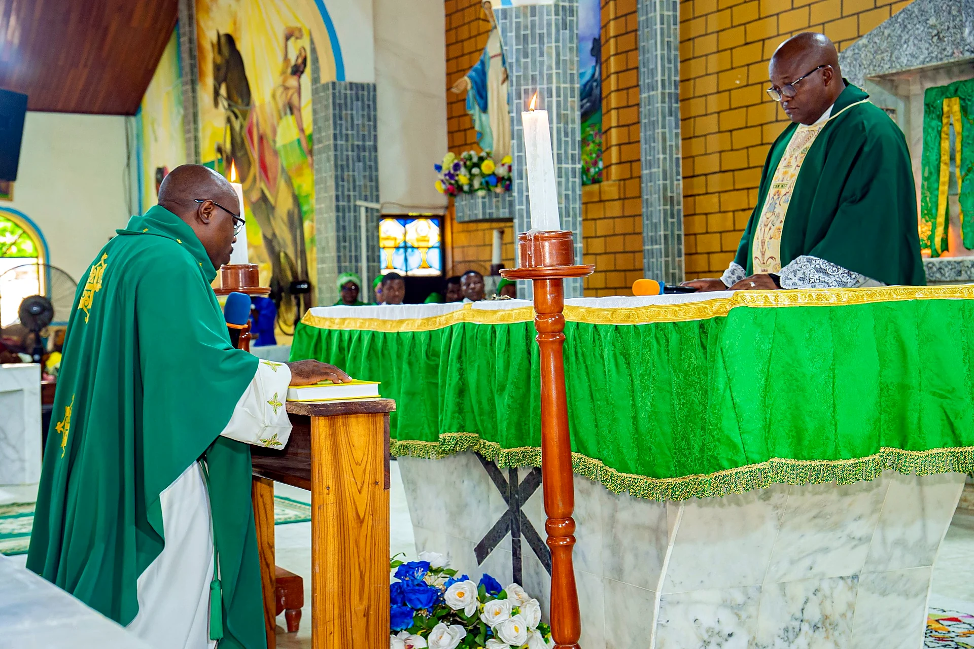 Fr. Mark Ameh Installed as Parish Priest of St. Joseph the Worker, Bonaberi Fr. Mark makes his profession of faith