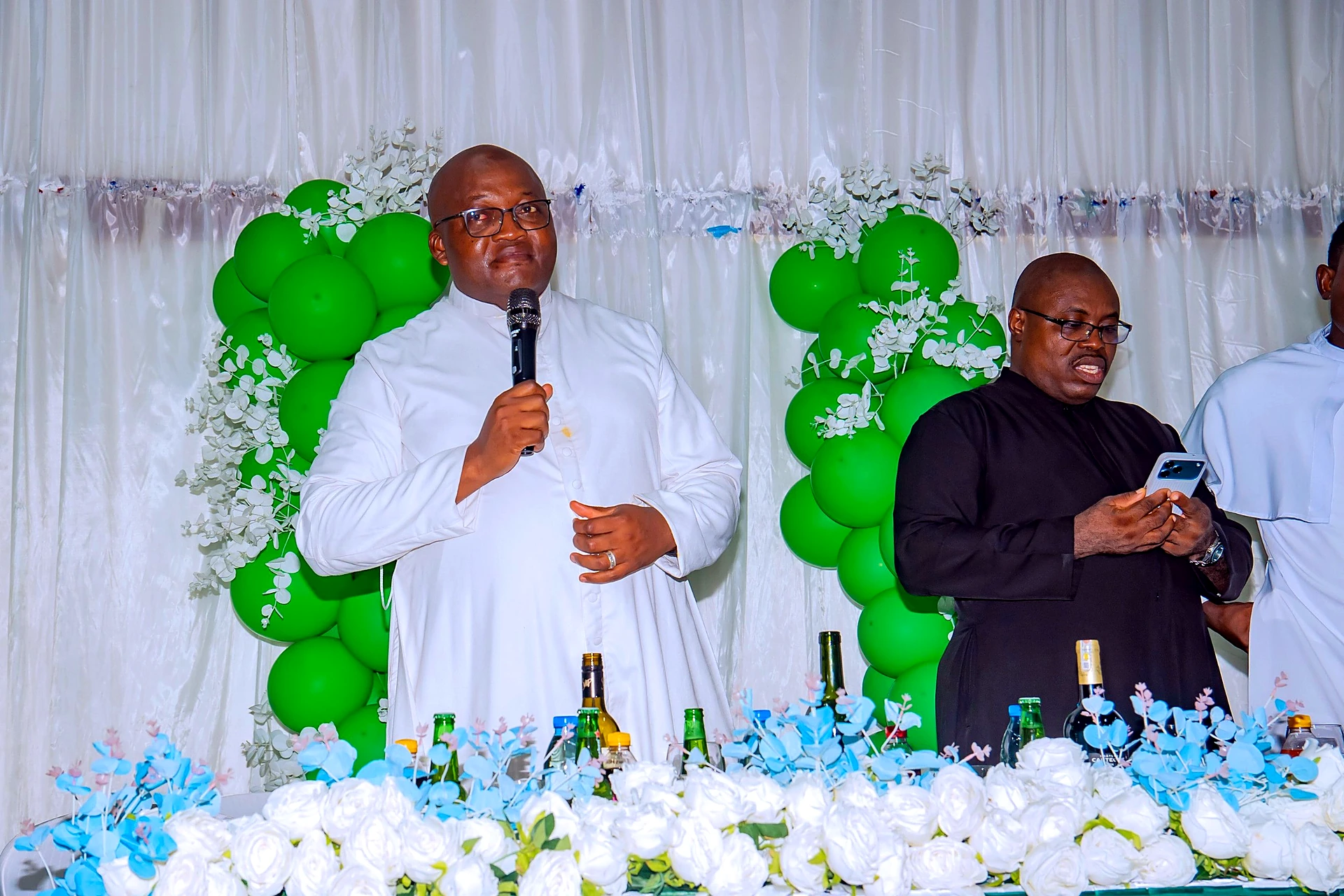 Fr. Mark Ameh Installed as Parish Priest of St. Joseph the Worker, Bonaberi Monsignor Choumbo and the parish priest at the reception