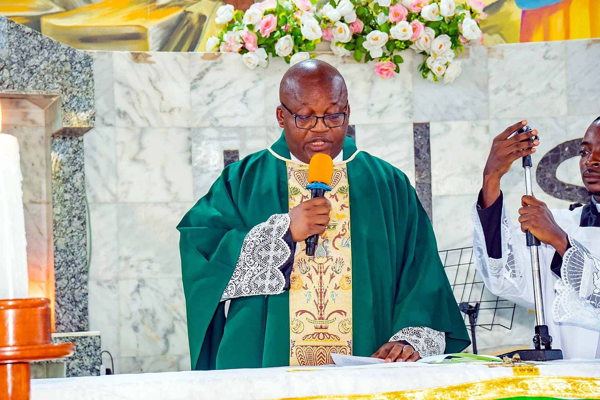 Fr. Mark Ameh Installed as Parish Priest of St. Joseph the Worker, Bonaberi Monsignor Choumbo delivers the homily
