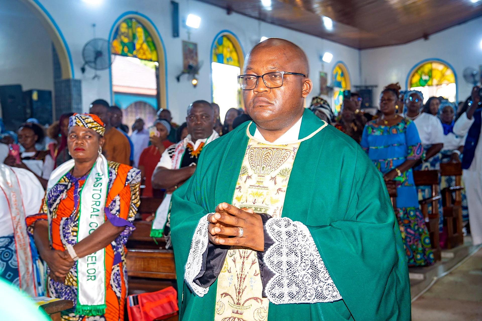 Fr. Mark Ameh Installed as Parish Priest of St. Joseph the Worker, Bonaberi Monsignor Michael Choumbo, Episcopal Vicar of Wouri Zone 8