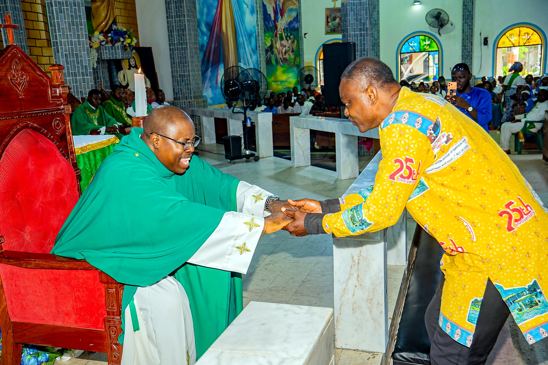 Fr. Mark Ameh Installed as Parish Priest of St. Joseph the Worker, Bonaberi The President of St. Mulumba greets Fr. Mark